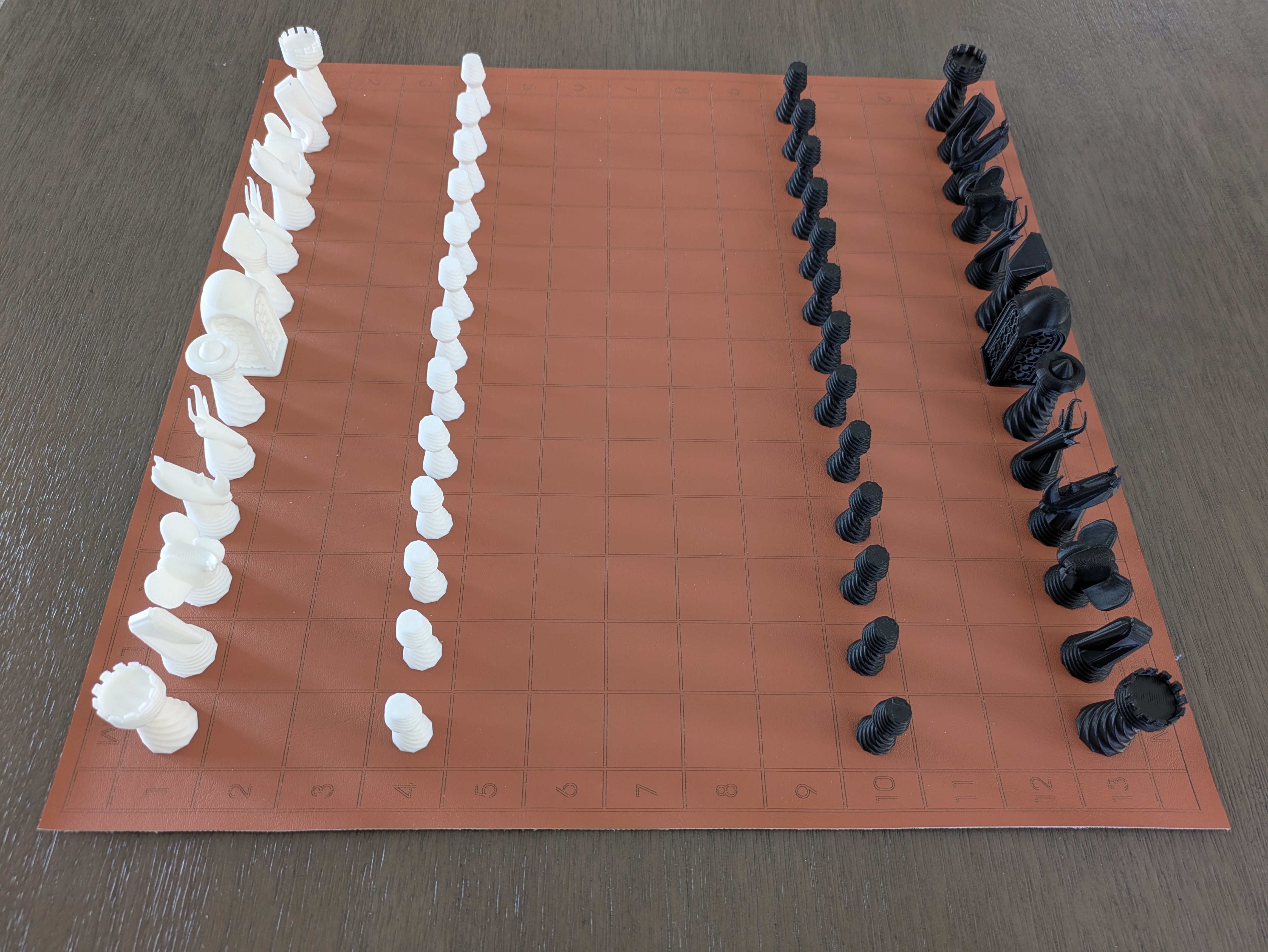 A Turkish Great Chess set in starting array on a 13x13 board.